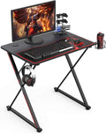 31'' Gaming Desk, X-Shape Computer Desk with Free Mouse Pad, Cup Holder& Headphone Hook & Controller Stand, Gamer Workstation for Home Office, Black